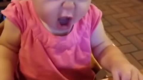 Babies trying lemon for the first time