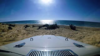 Jeep CJ5 at the beach