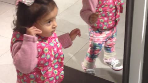 Toddler discovers how mirrors work, becomes totally obsessed