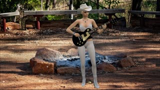 Zsa Zsa plays the guitar and sings a Campfire song, Marshmallow Melody.