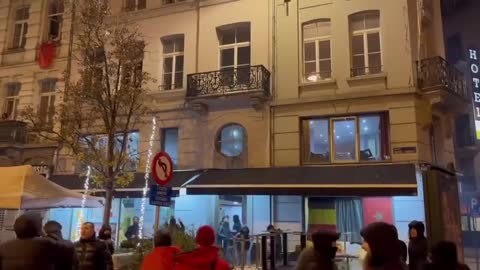 In Brussels, Belgium, a neighbor was forced to remove the French flag from his balcony