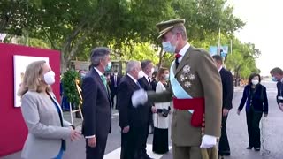 Spain's Royals preside over military parade