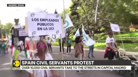 Over 10,000 civil servants take to streets in Spain over wage rise | Latest News | WION