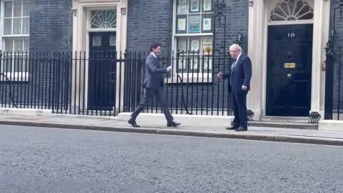 Slinking in the back door. Justin Trudeau at 10 Downing.