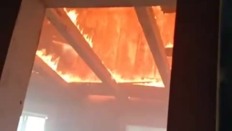 UAF shelter is on fire after being hit by a Russian artillery shell