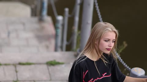 Blond Girl is Getting Ready To Take Pictures