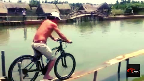 Epic Bike Fail: Hilarious River Plunge Adventure