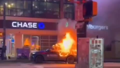 Police car ablaze as Antifa run riot across Atlanta.