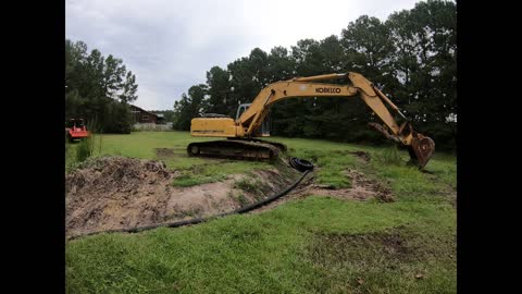Digging a Retention Pond with An Overflow