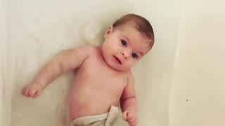 Baby girl absolutely loves bath time