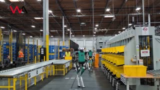 Amazon unveils 6-foot robots that walk and lift items in its warehouses
