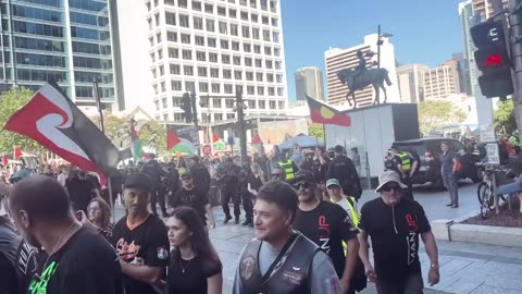 Māori men standing for Israel in the face of Hamas supporters down under