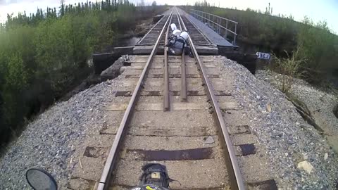 Motorcycle Falls Through Railroad Track