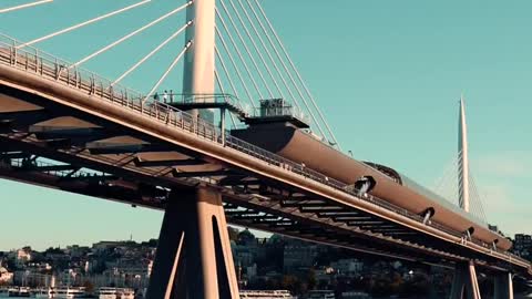 A Motorboat Crossing a Bridge