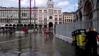 Venice's St. Mark's Square flooded in high season