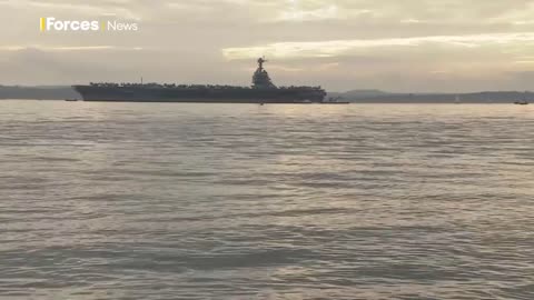 US Navy aircraft carrier USS Gerald R Ford anchors off UK coast