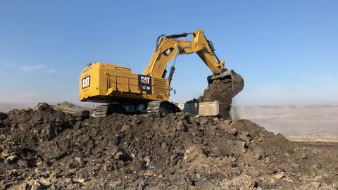 Caterpillar 6015B Excavator Loading Trucks With Two Passes - Sotiriadis Mining Works