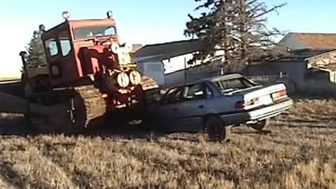 Bulldozer vs Ford Tempo