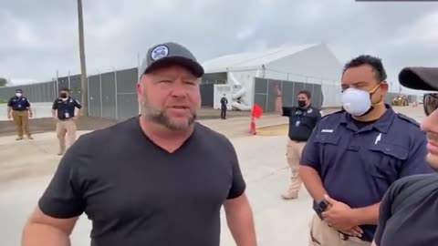 Alex Jones showing a video of children allegedly being illegally smuggled.