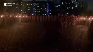 Azov and nationalist battalions hold torch ceremony during funeral
