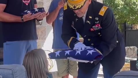 A Colonel presenting the flag to his grandnieces.🇺🇸