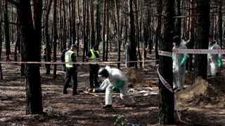 Bodies of Ukrainian servicemen exhumed in Izium mass grave