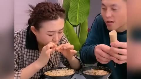 HUSBAND AND WIFE EATING FOOD COMEDY