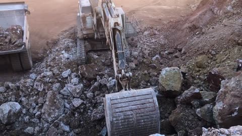 Liebherr 984 Excavator Loading Caterpillar Dumpers - Sotiriadis_Labrianidis Mining Works