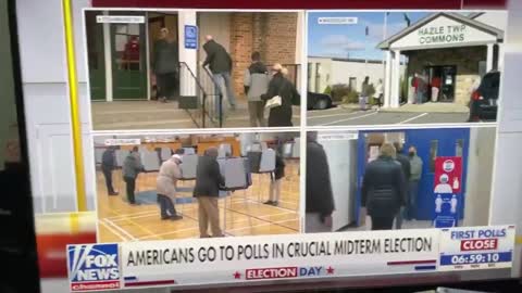 Masked Poll Worker Fills in Ballots on Live TV