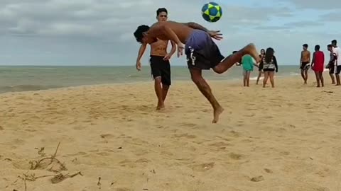 Imagine walking pass these soccer skills on the beach