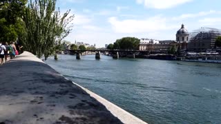 Riverwalk Time lapse Scene River Boats Clear Day