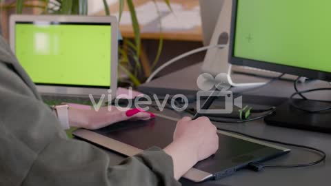 Close Up Of An Unrecognizable Female Graphic Designer Using Digital Drawing Tablet In The Office