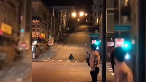 Dude Sliding A Hill Like A Boss On Trash Can