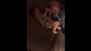 Baby laughs at mommy