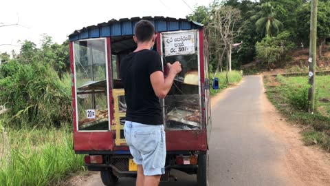 Tuktuk Tows Skateboarder