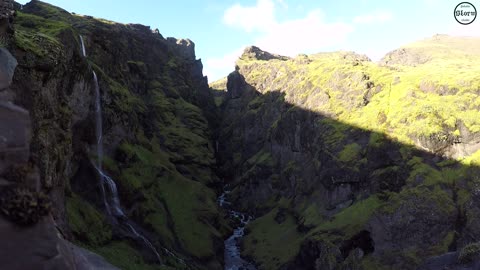 Epic valey in Iceland, high waterfall, beautiful nature