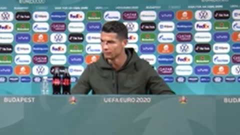 Rolando removed bottles of Coca-Cola from Euros press conference