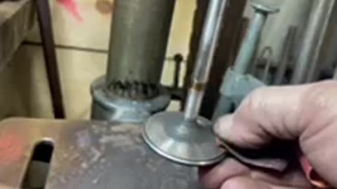 Cleaning up small block valve on a drill press