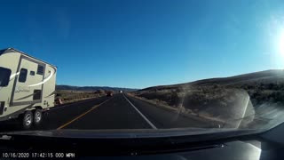 Car Swerves off Road to Dodge Truck Passing Semi
