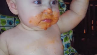 Baby girl makes gigantic mess of her lasagna