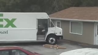 Fedex guy launches boxes off truck