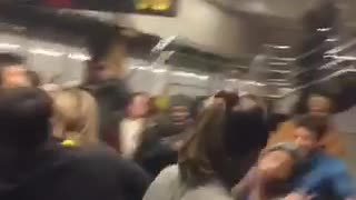 Dance music playing in subway station full of people