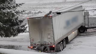 Truck Stuck Across Road