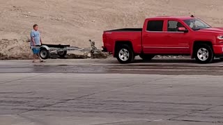 Dad Gets Impatient While Teaching Daughter to Back Trailer Down Boat Ramp