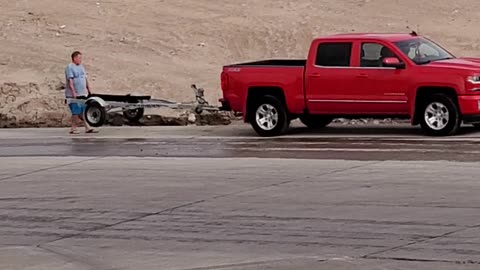 Dad Gets Impatient While Teaching Daughter to Back Trailer Down Boat Ramp