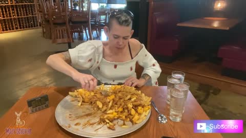 WORLDS LARGEST POUTINE CHALLENGE! 15 LBS! | WOMAN VS FOOD