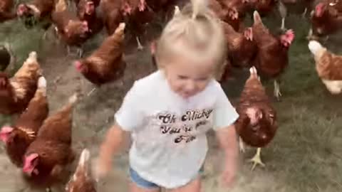 Adorable Little Girl and Her Army of Chickens -- ViralHog.