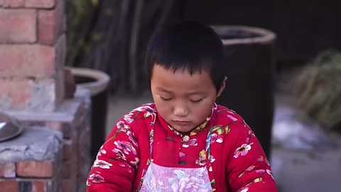 Tiney child making food