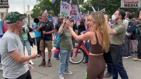A pro-abortion protester heckles at activists with Students for Life