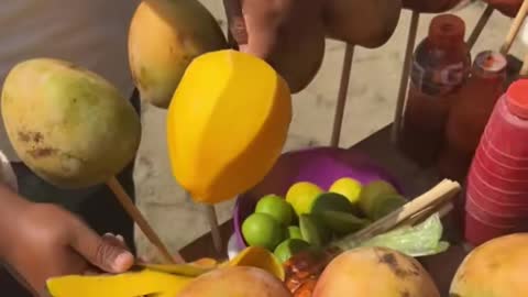 Fresh mangoes on the beach in